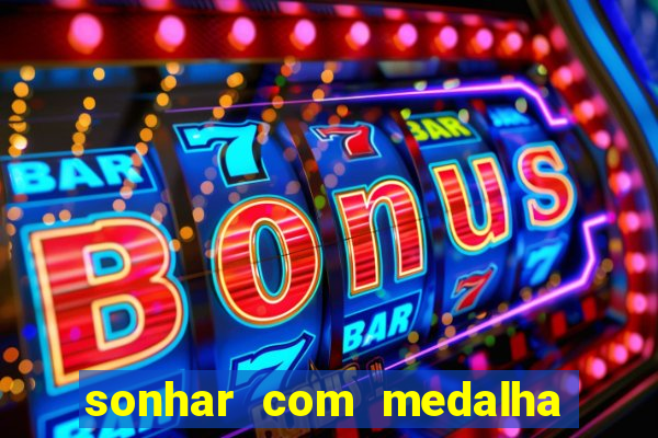 sonhar com medalha de santo